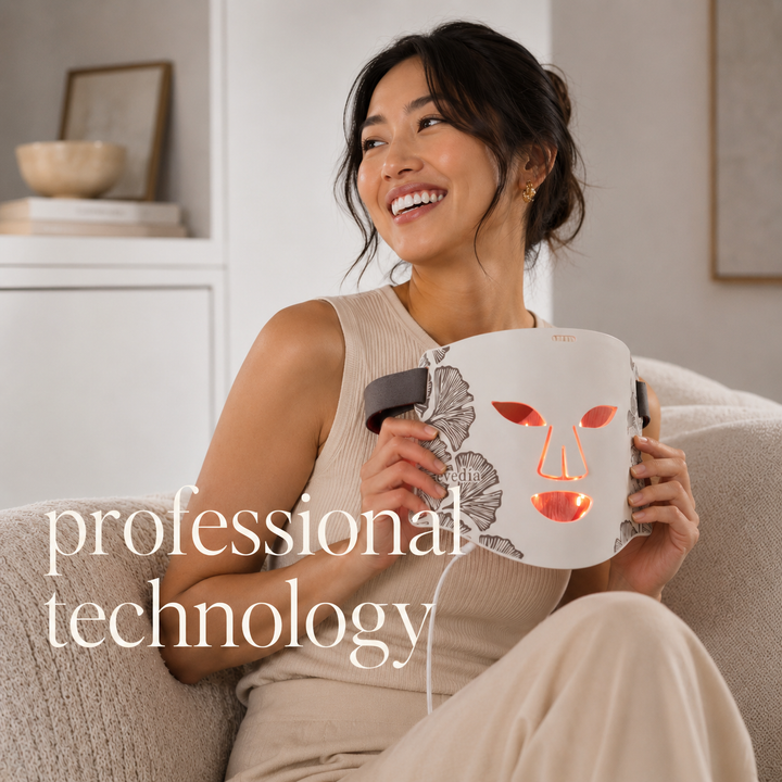 Woman using the Evedia LED mask — Science. Care. Confidence.